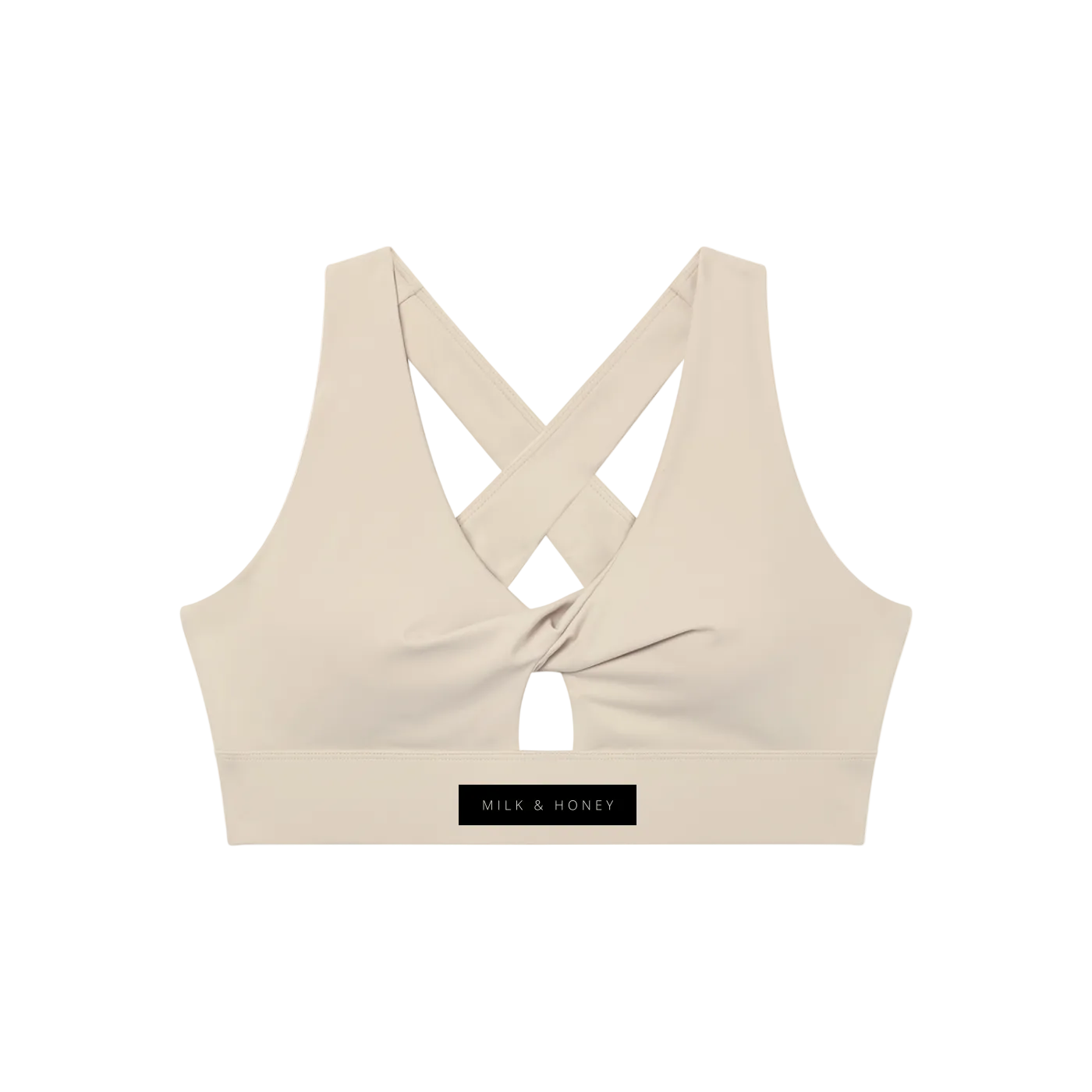 Sleeveless twist-front sports bra with wide crisscross back straps, small front keyhole and 'MILK & HONEY' label on band