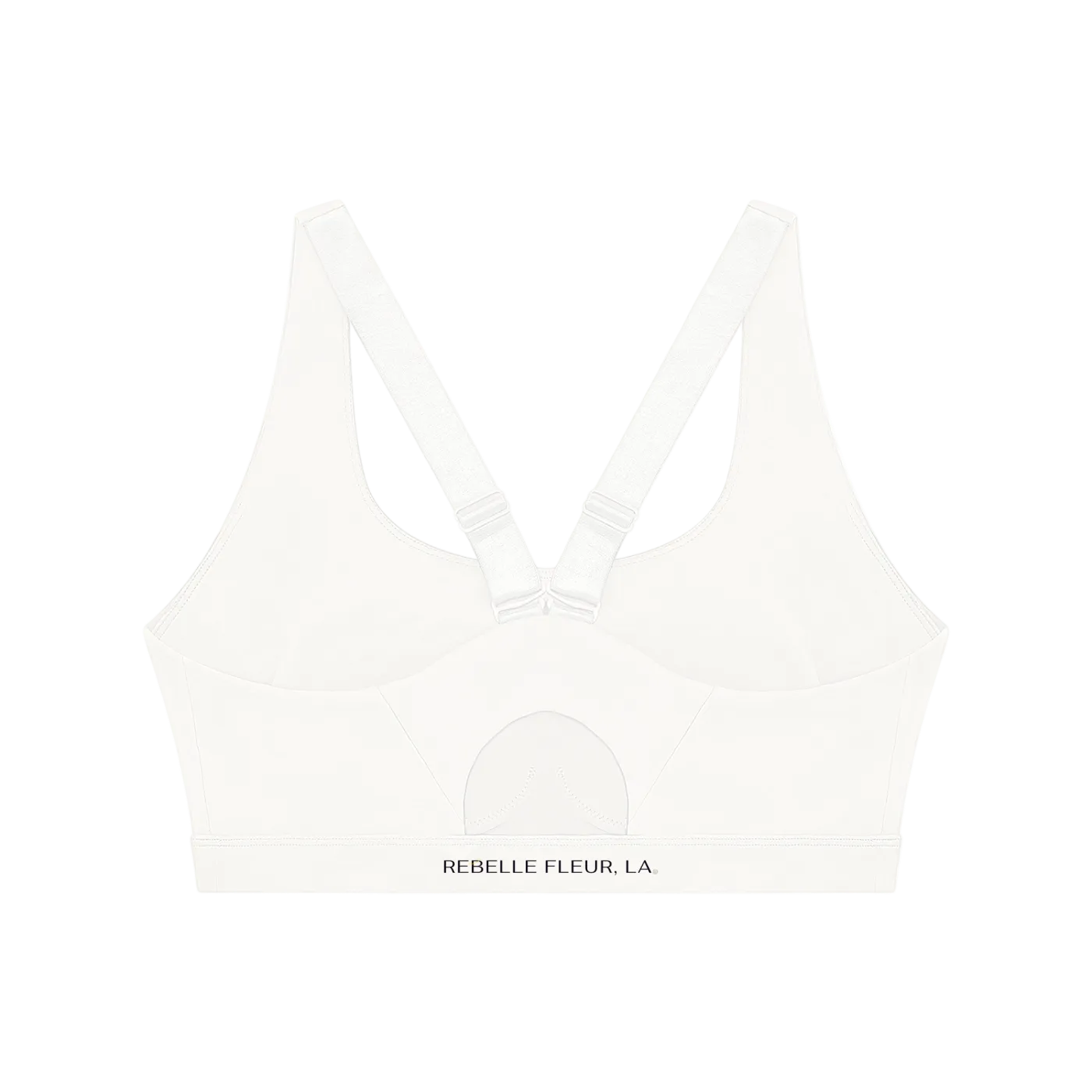 Back of white sports bra with V straps, adjustable hardware, stitched semi-circle detail and 'REBELLE FLEUR, LA.' on band.