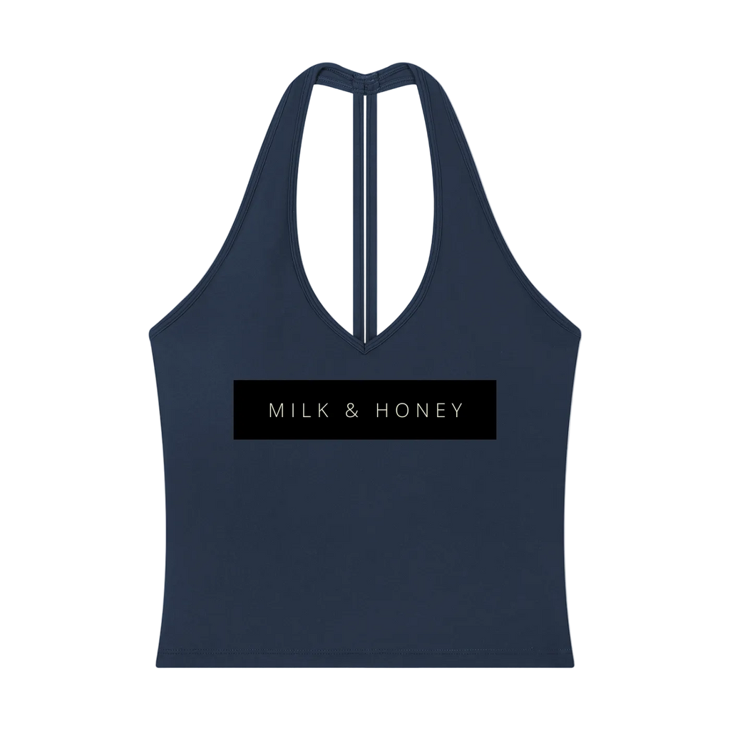 Halter V-neck cropped tank with narrow vertical racerback strap and centered rectangular 'MILK & HONEY' logo