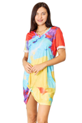 Model wearing multicolor tie-dye V-neck short-sleeve dress with front twisted knot