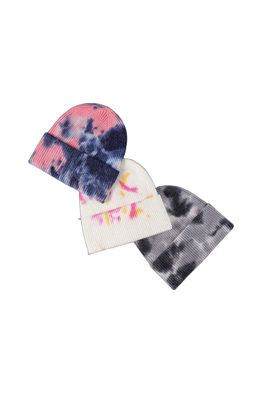 Three cuffed rib-knit beanies flat: pink/navy, white with pink and yellow accents, and gray/black tie-dye.