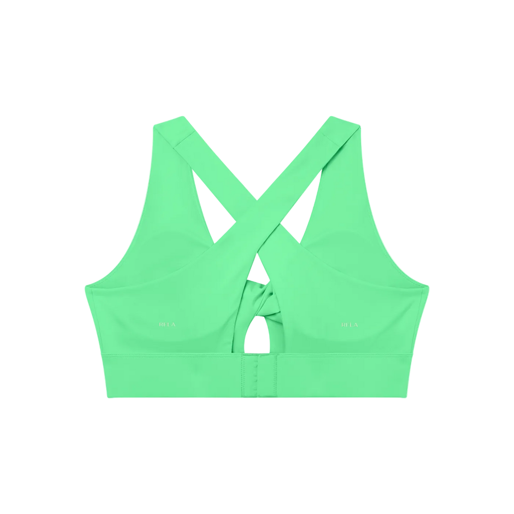 Mint-green sports bra back with crossed straps, small keyhole and hook-and-eye band closure