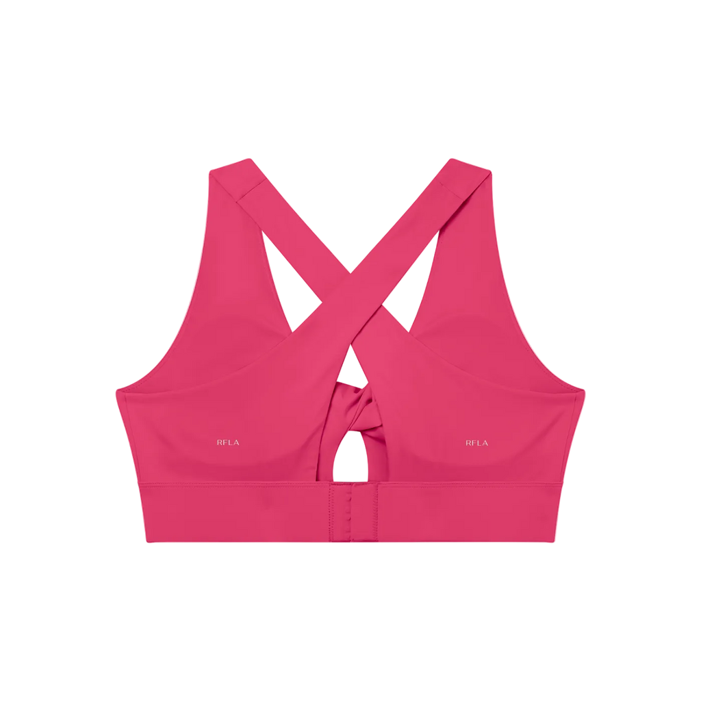 Fuchsia sports bra with wide crossed back straps, center twist knot, hook-and-eye back closure and small RFLA logos