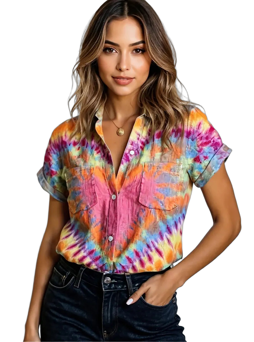 Short-sleeve tie-dye button-up shirt with chest pockets and rolled cuffs, tucked into dark jeans