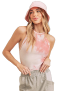 Woman wearing ribbed pink tie-dye round-neck tank, light pink bucket hat and gray sweatpants, hands at waistband