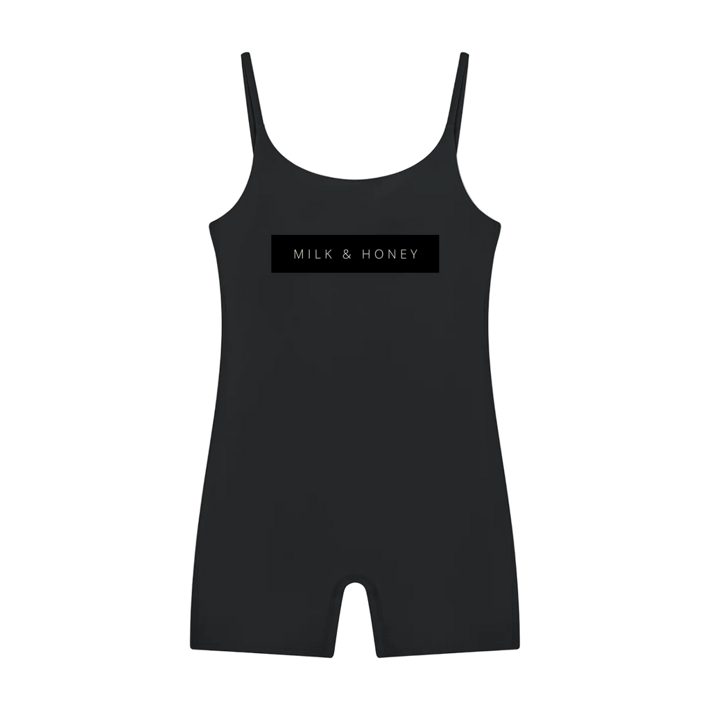 Sleeveless U-neck romper with thin spaghetti straps and centered rectangular 'MILK & HONEY' chest logo