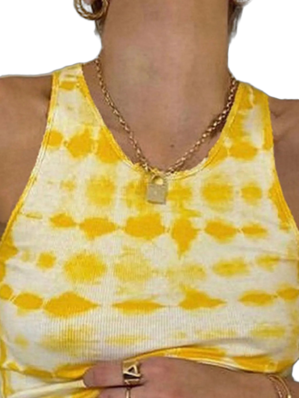 Ribbed yellow-and-white tie-dye tank top with gold chain pendant and a hand wearing a gold ring at the waist