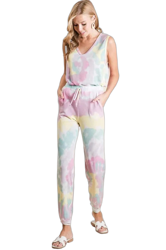 Model wearing pastel tie-dye jogger pants with drawstring waist, side pockets and elasticized ankle cuffs