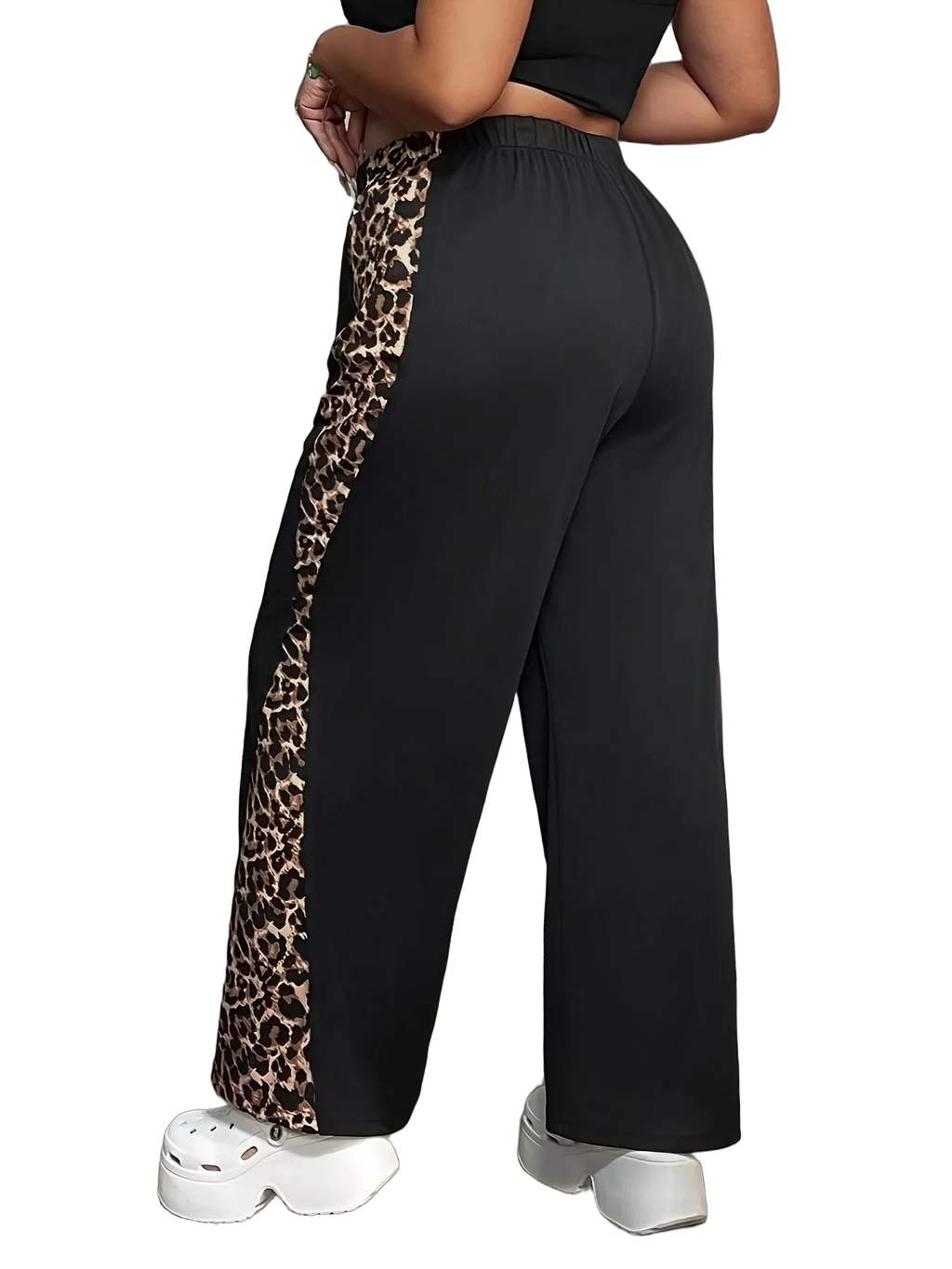 Rear view black wide-leg pants with leopard side stripe, elastic waistband, paired with white platform clogs