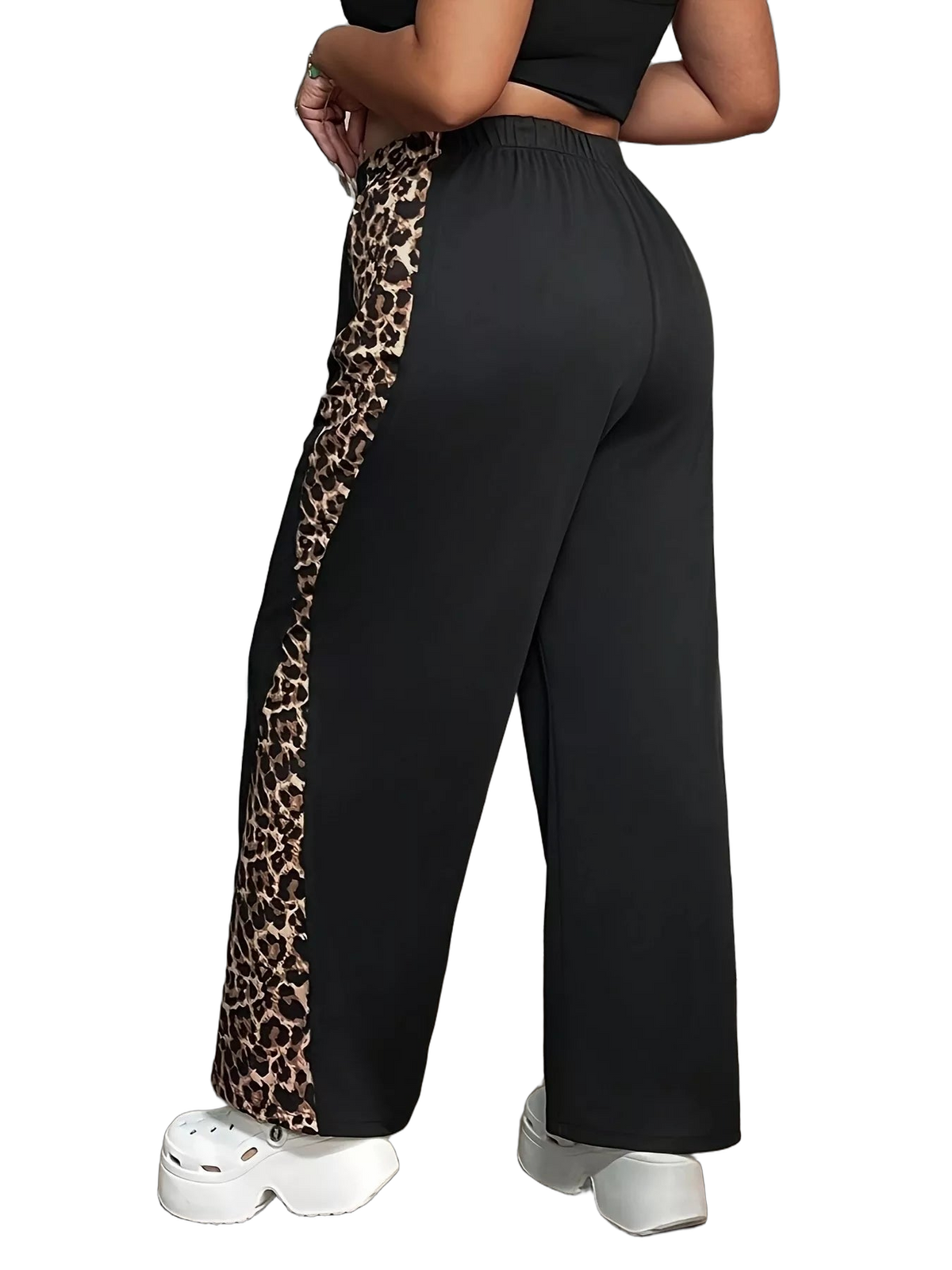 Rear view black wide-leg pants with leopard side stripe, elastic waistband, paired with white platform clogs