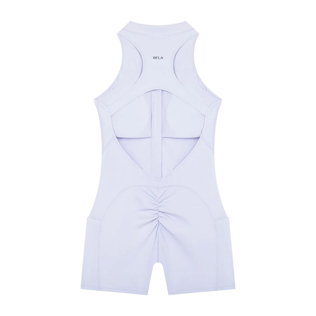 Back view sleeveless romper with racerback cutout, vertical center seam, ruched rear seam, short legs and small 'RFLA' logo