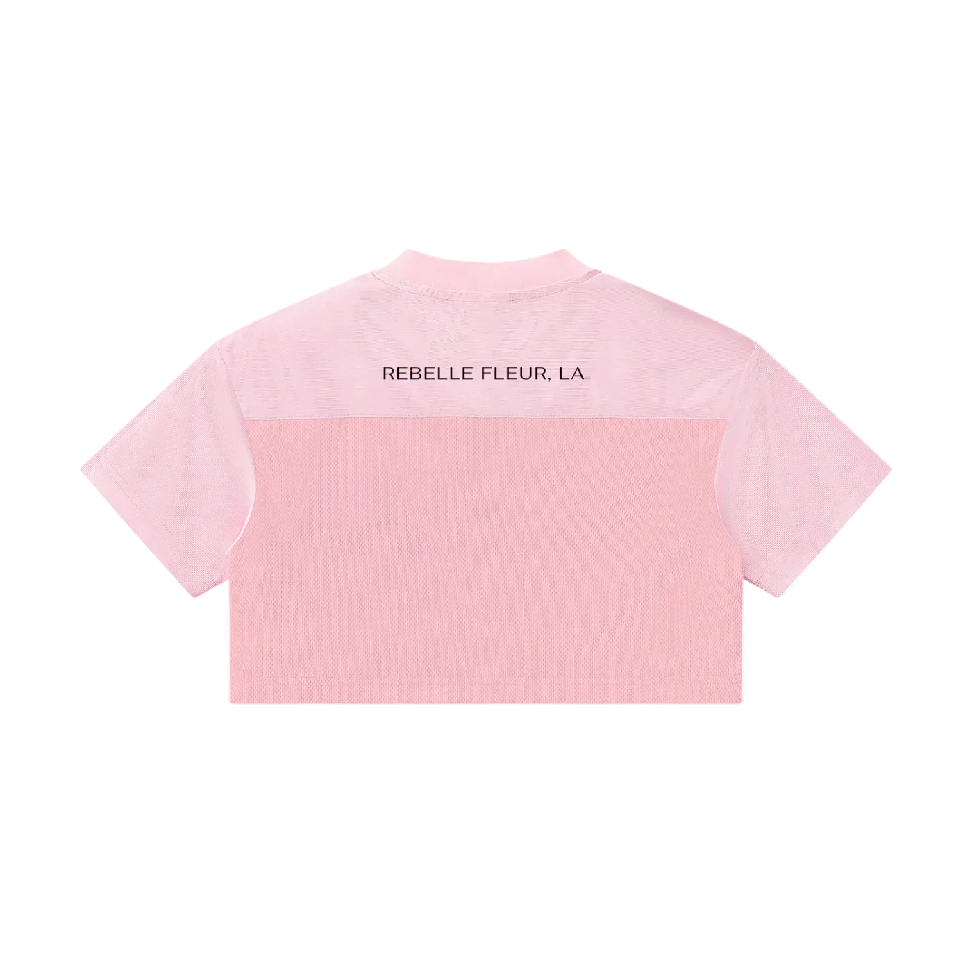 Back of cropped pink paneled jersey with short sleeves and 'REBELLE FLEUR, LA' text across upper back
