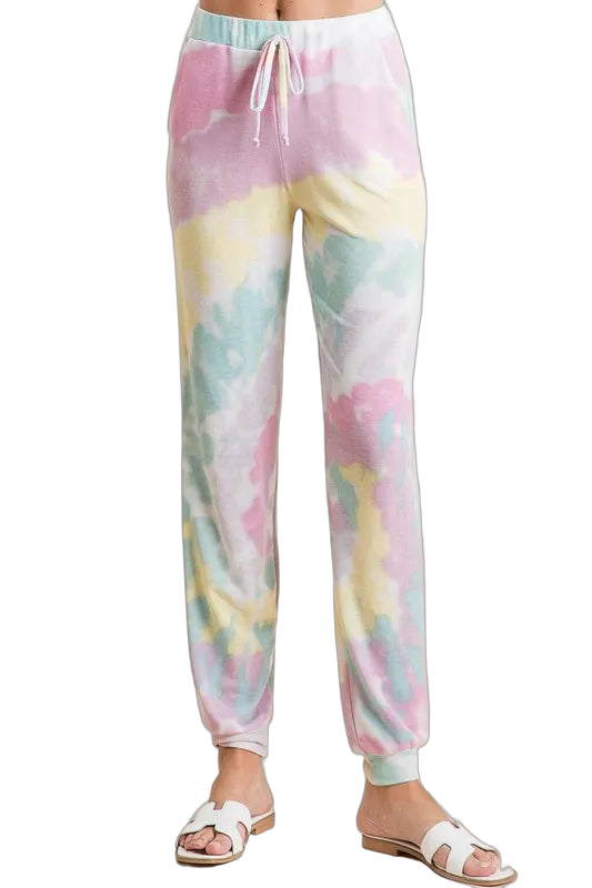 Front view tie-dye lounge pants with drawstring waist, elastic ankle cuffs, pastel lavender, yellow, and mint swirls