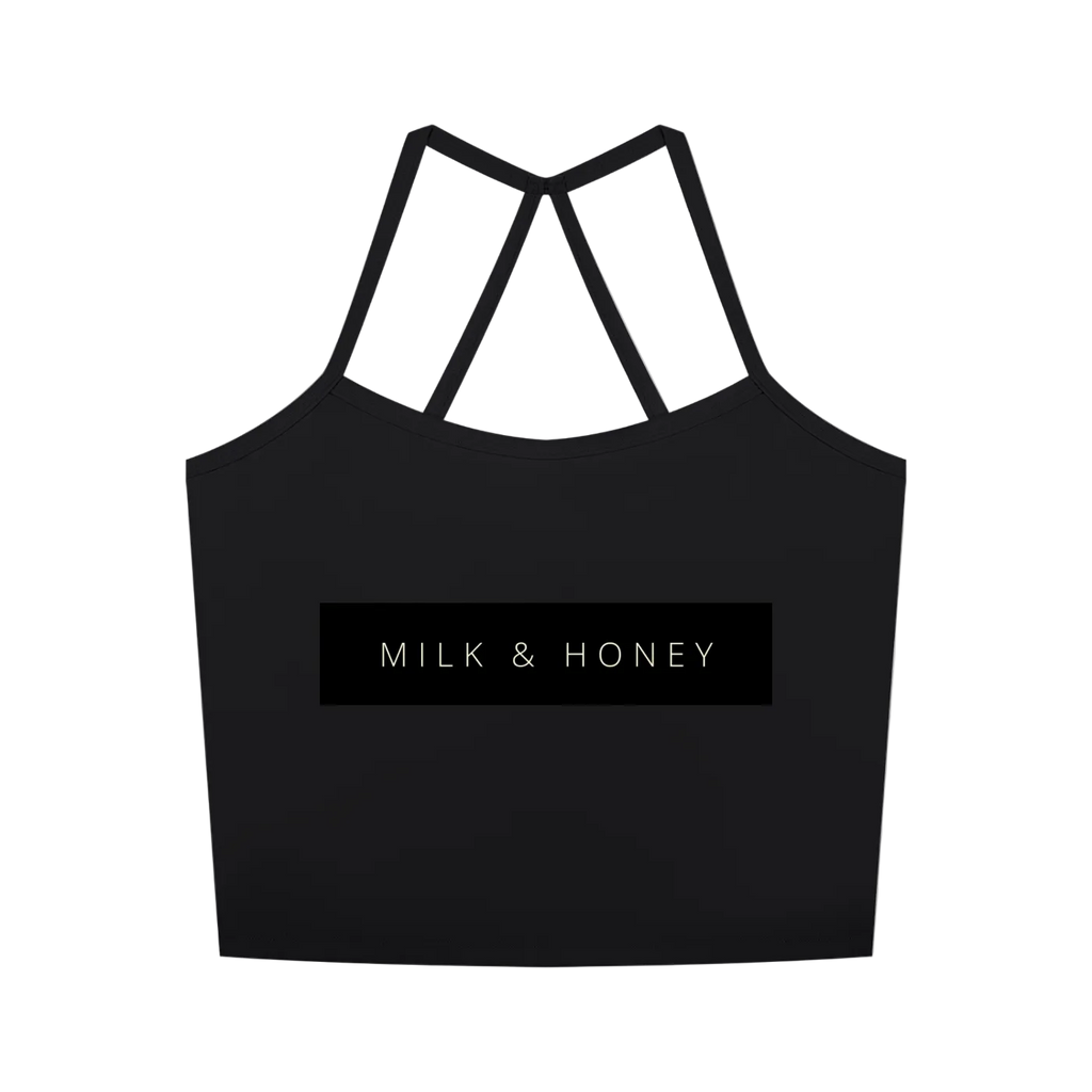 Cropped sleeveless tank with thin crossed back straps and centered rectangular "MILK & HONEY" logo