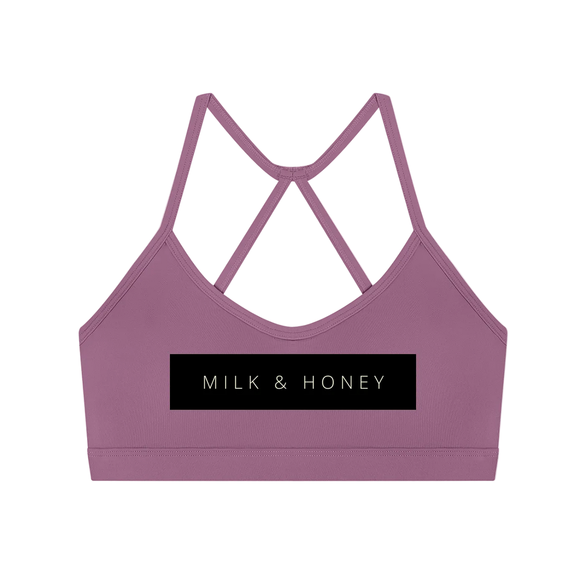 Mauve cropped sports bra with thin crisscross back straps and centered black 'MILK & HONEY' logo panel