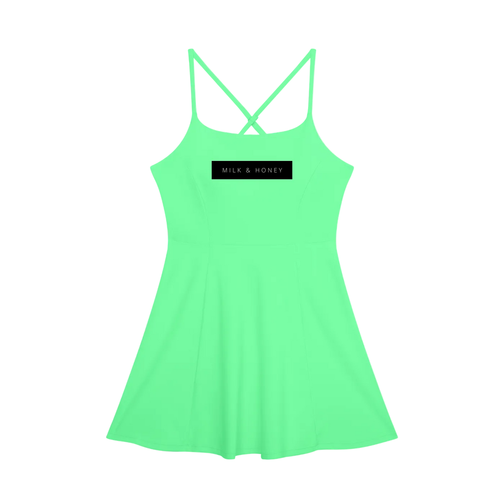 mint green sleeveless A-line dress with thin crossed shoulder straps and rectangular 'MILK & HONEY' chest label