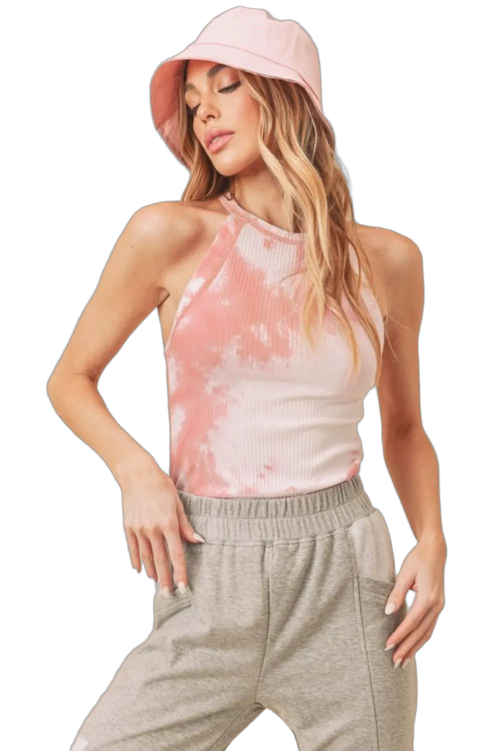 Woman wearing coral ribbed tie-dye high round-neck tank with elastic-waist gray sweatpants and pink bucket hat