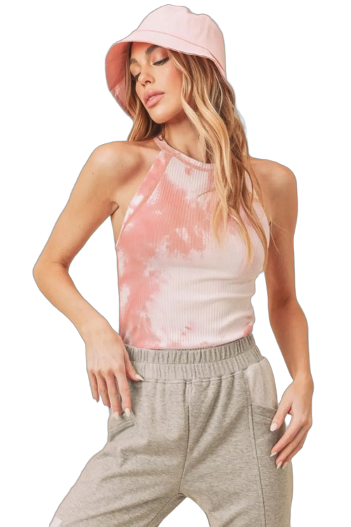Woman wearing coral ribbed tie-dye high round-neck tank with elastic-waist gray sweatpants and pink bucket hat