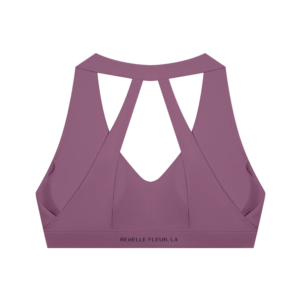 Plum purple cropped sports bra with crossed racerback straps, V-shaped back cutout and elastic underbust band with brand…