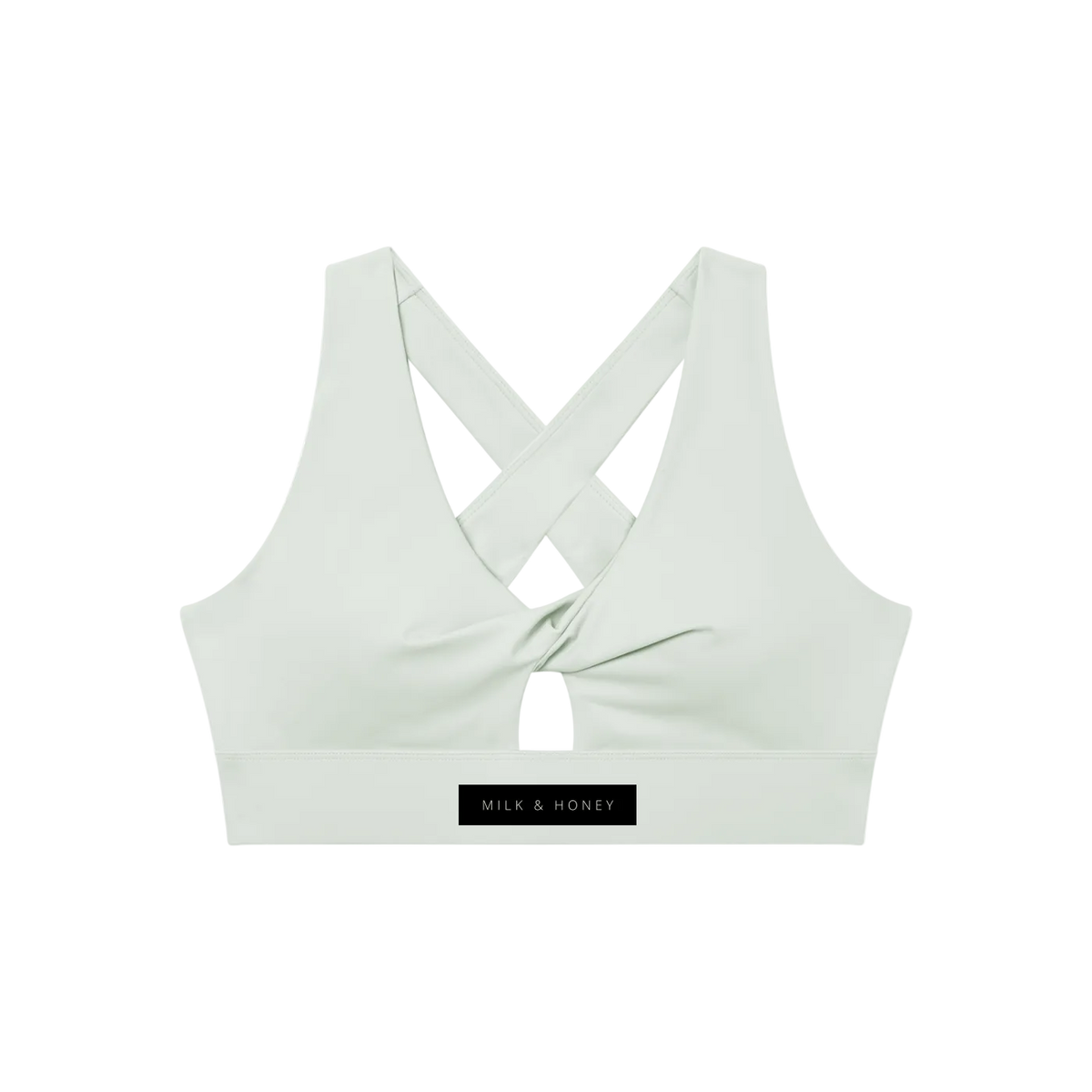 Sports bra back with twist-front band, crossed shoulder straps, small center keyhole and 'MILK & HONEY' label.