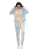 Tie-dye hoodie and jogger set in light blue and peach, hood with drawstrings, cuffed ankles, paired with white sneakers