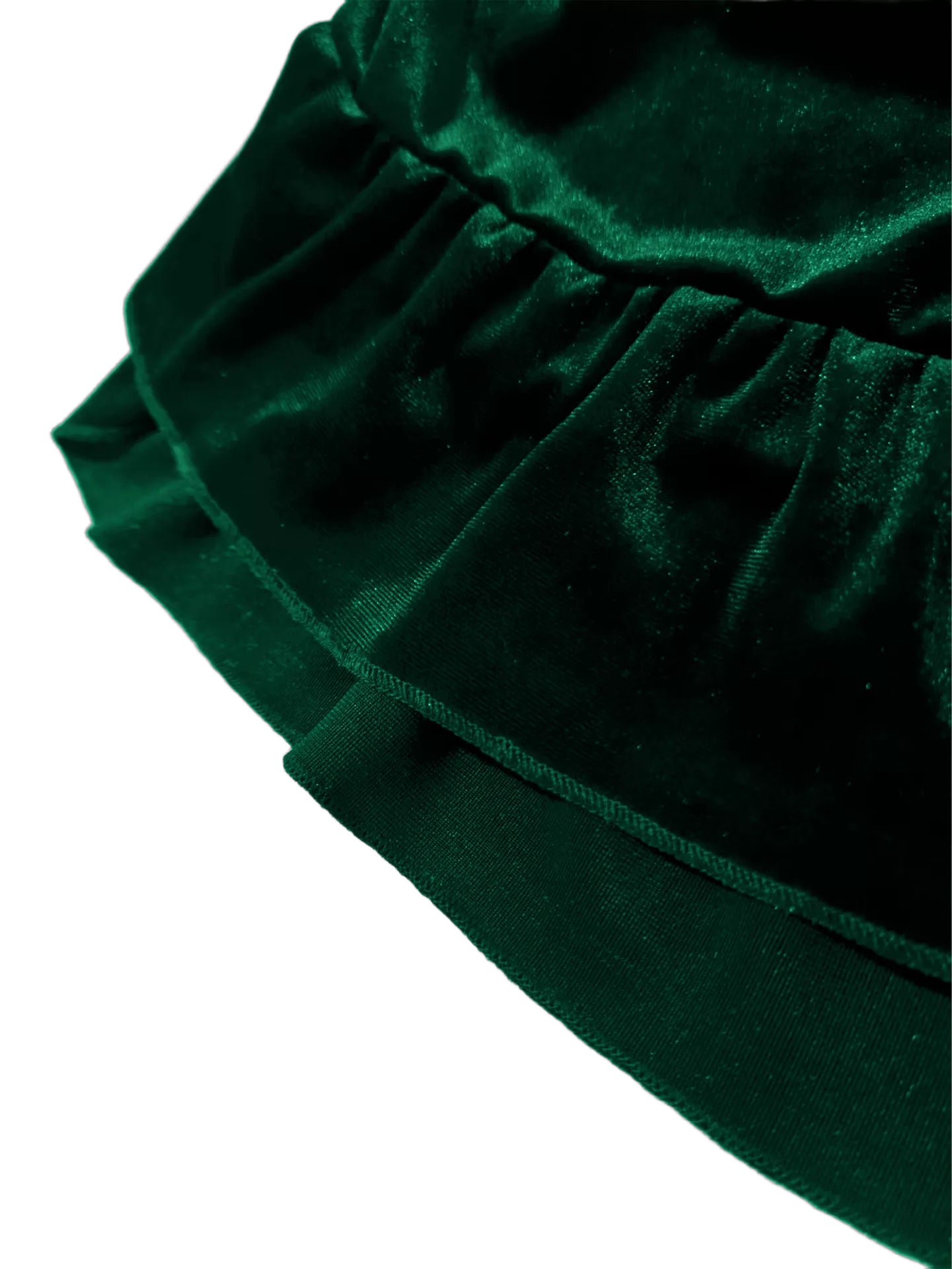 Close-up of ruffled velvet skirt tiers with gathered waistband and seam detail