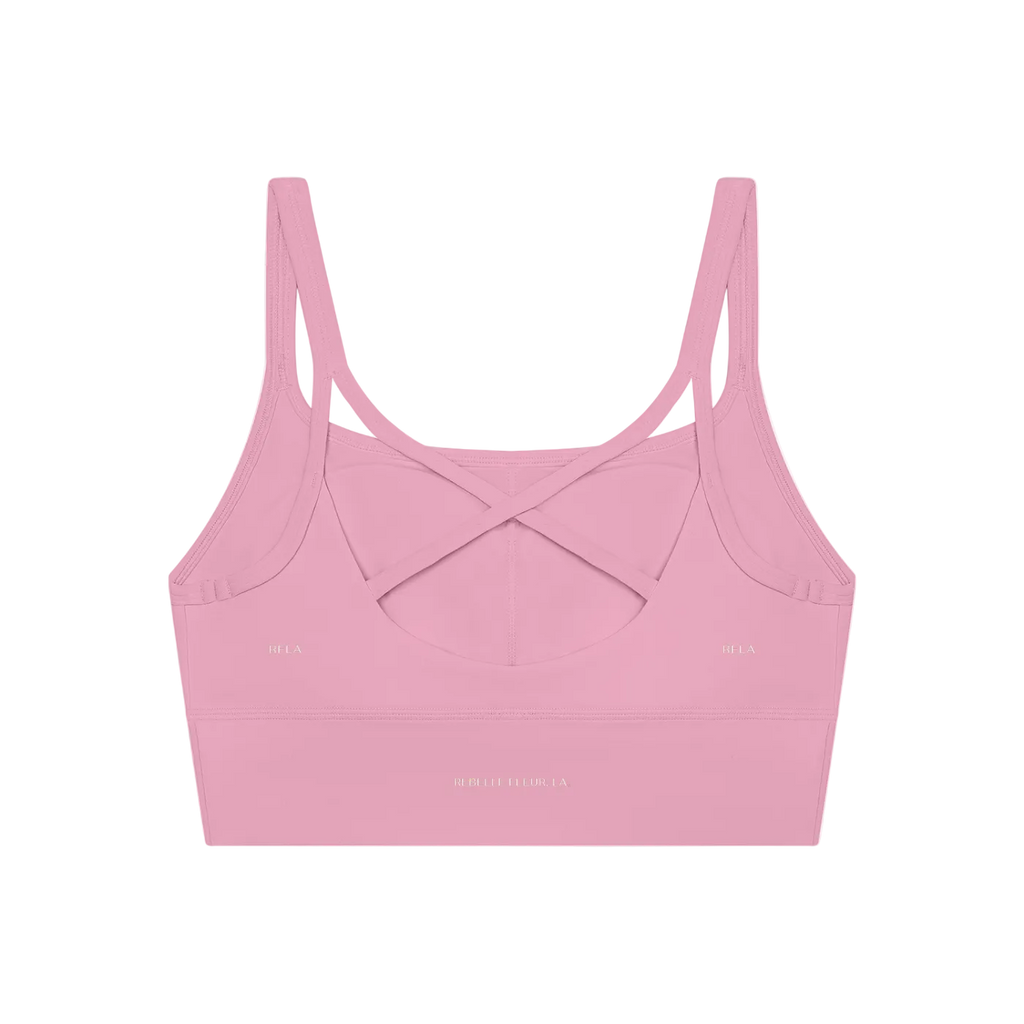 Pink cropped women's yoga tank with thin shoulder straps and crisscross back straps