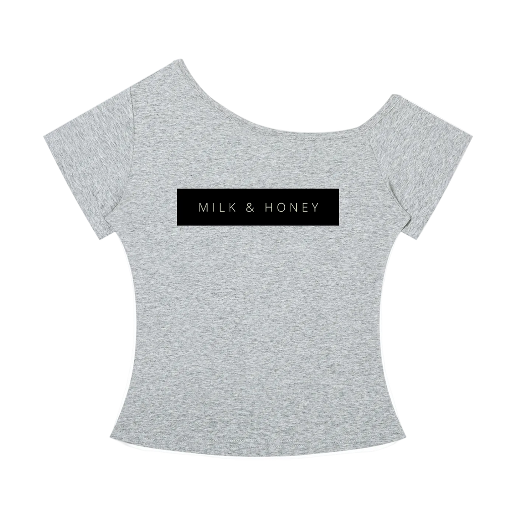 Heather gray off-the-shoulder women's T-shirt with short sleeves and black rectangular chest print reading MILK & HONEY