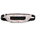 Top view of terrazzo-pattern fanny pack with black zipper, dual sliders, MILK & HONEY label and adjustable black straps