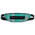 Turquoise waist bag with pink diagonal pattern, black zipper and strap, rectangular 'MILK & HONEY' label.