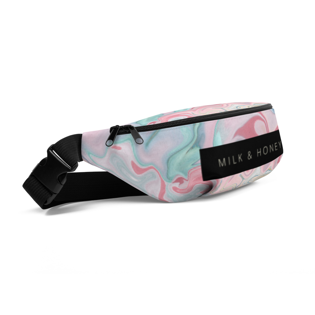 Pastel marble fanny pack top with black dual-zipper pulls, adjustable black strap, plastic buckle and 'MILK & HONEY' label