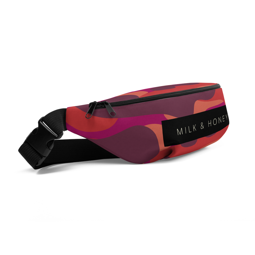 Waist bag top with black double zipper, plastic buckle and strap, red-purple abstract pattern and 'MILK & HONEY' label