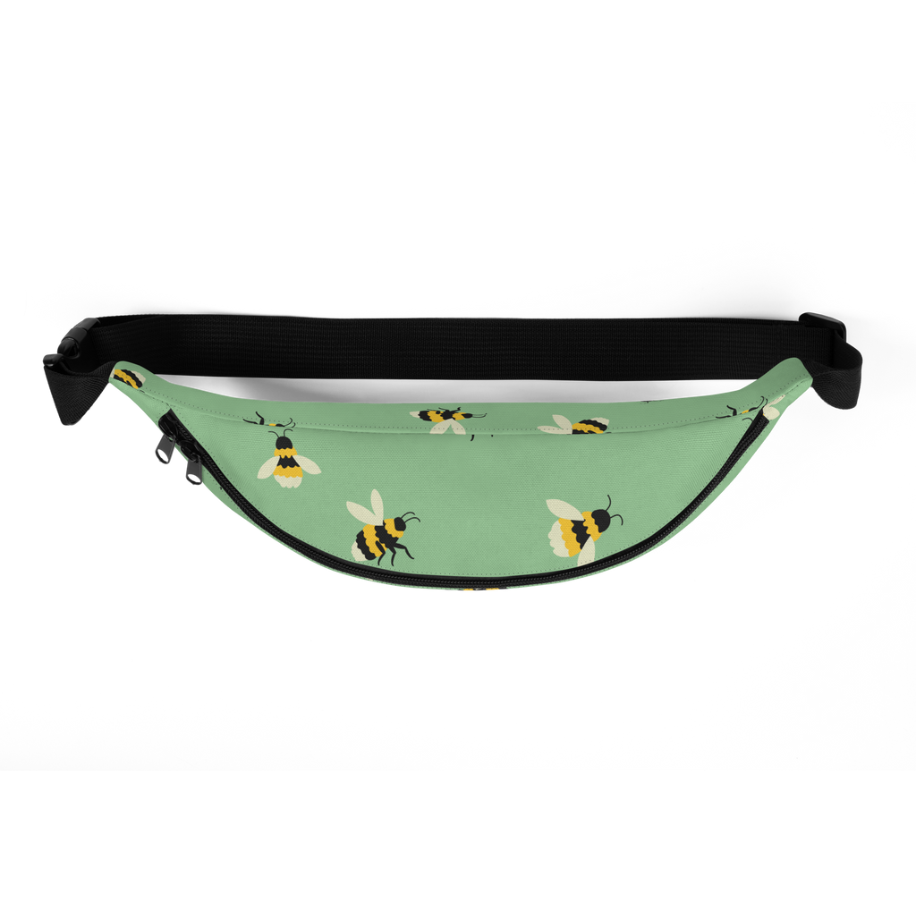 Mint green waist bag with yellow-and-black bee pattern, black zipper pulls and adjustable black strap