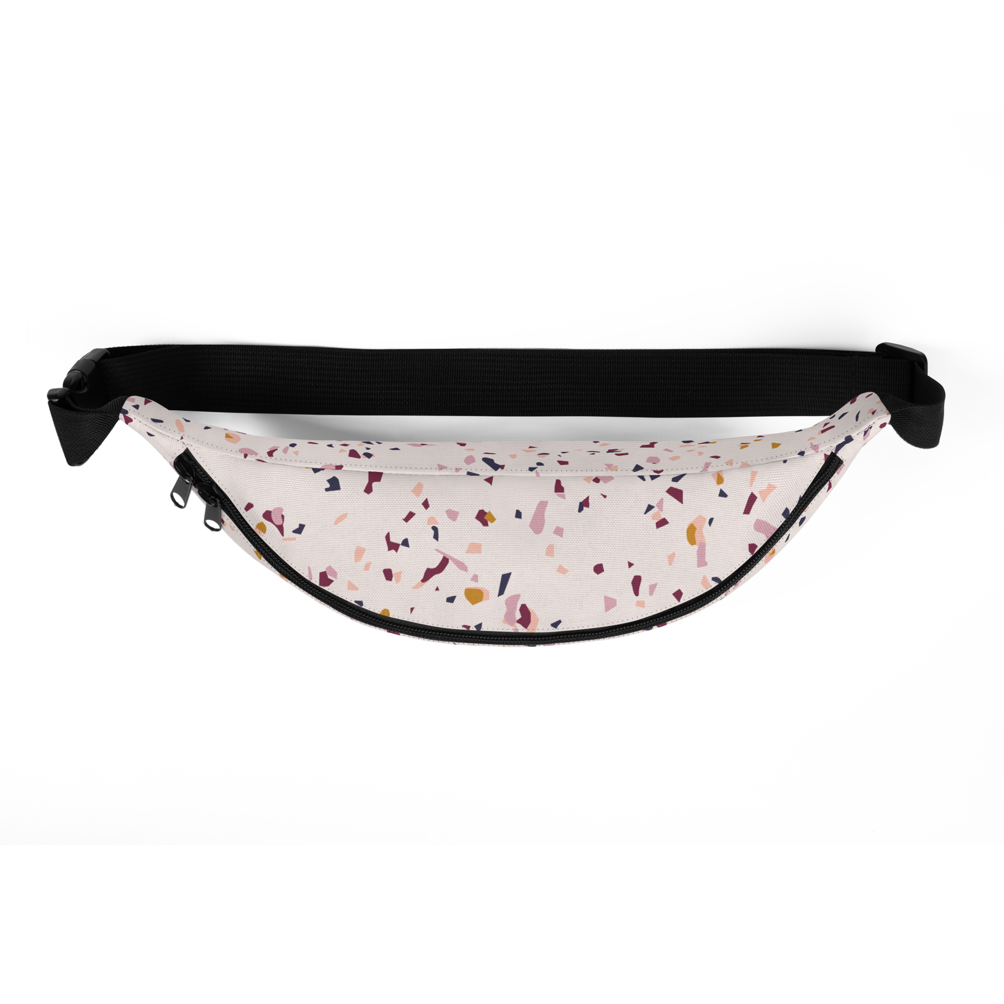 Black adjustable waist strap and zipper over light fabric with scattered confetti-like print and visible zipper pull