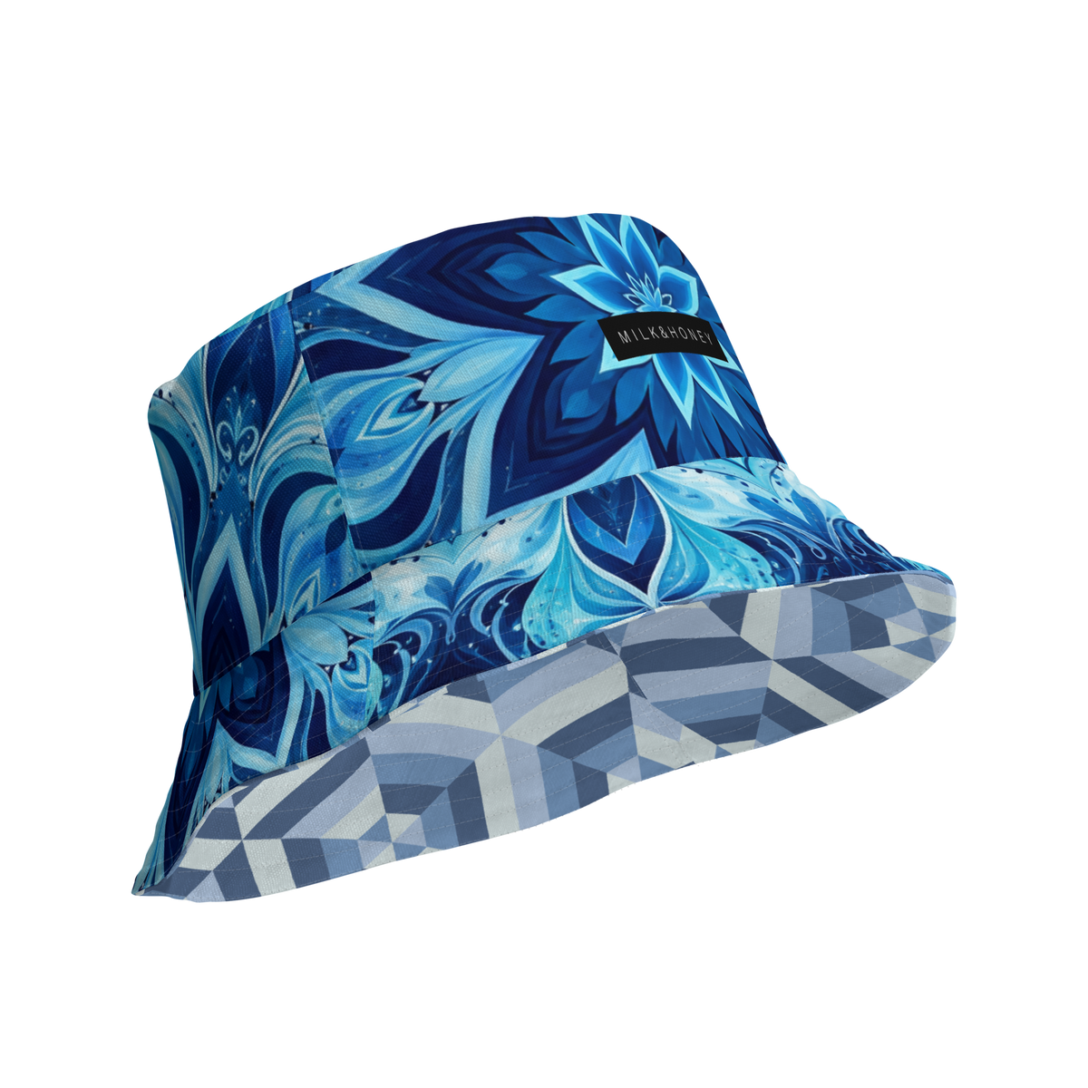 Bucket hat with blue floral mandala print, geometric inner brim and a MILK&HONEY label on the band.