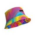 Bucket hat with concentric zigzag rainbow pattern, floral-printed underside and small black label reading 'MILK&HONEY'