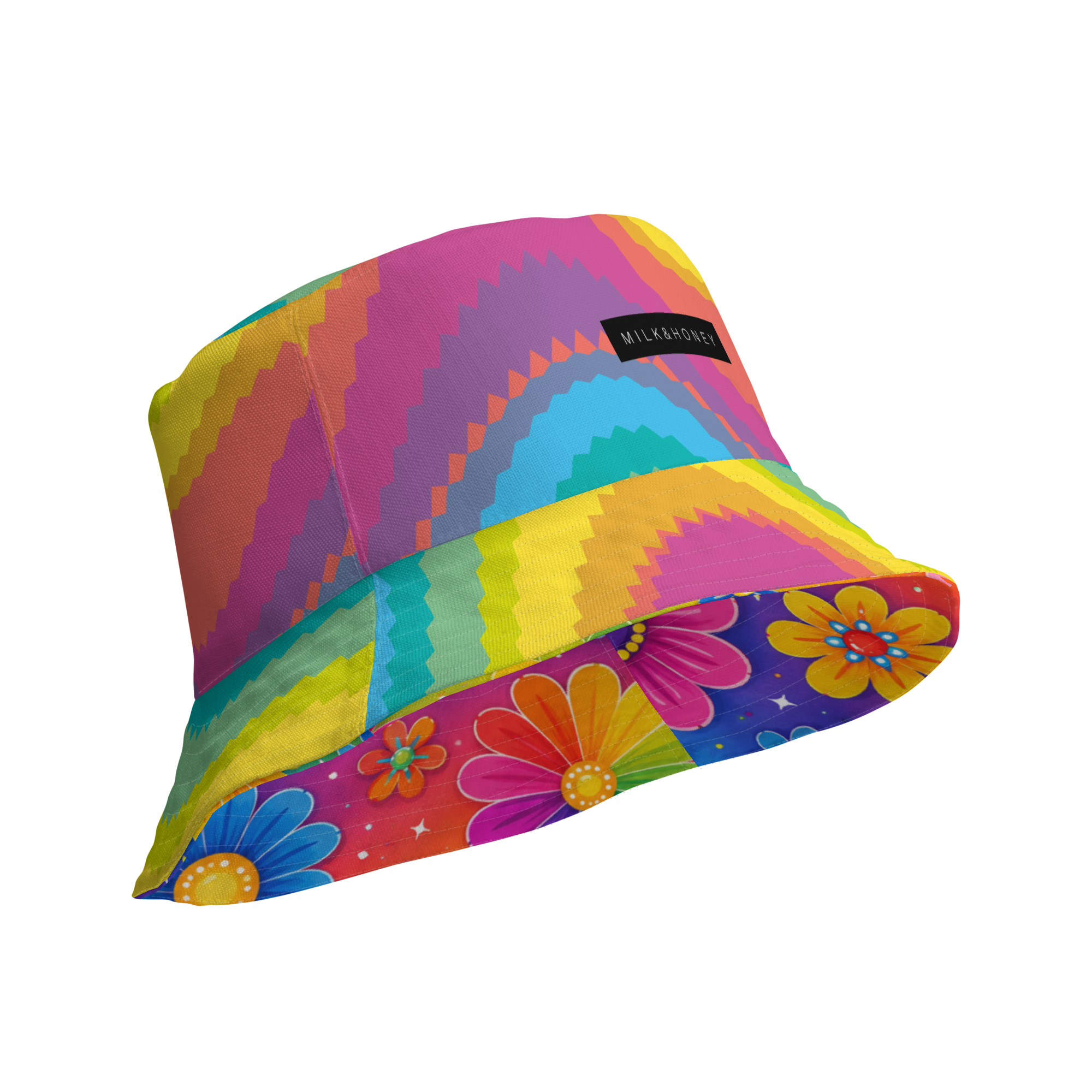 Bucket hat with concentric zigzag rainbow pattern, floral-printed underside and small black label reading 'MILK&HONEY'