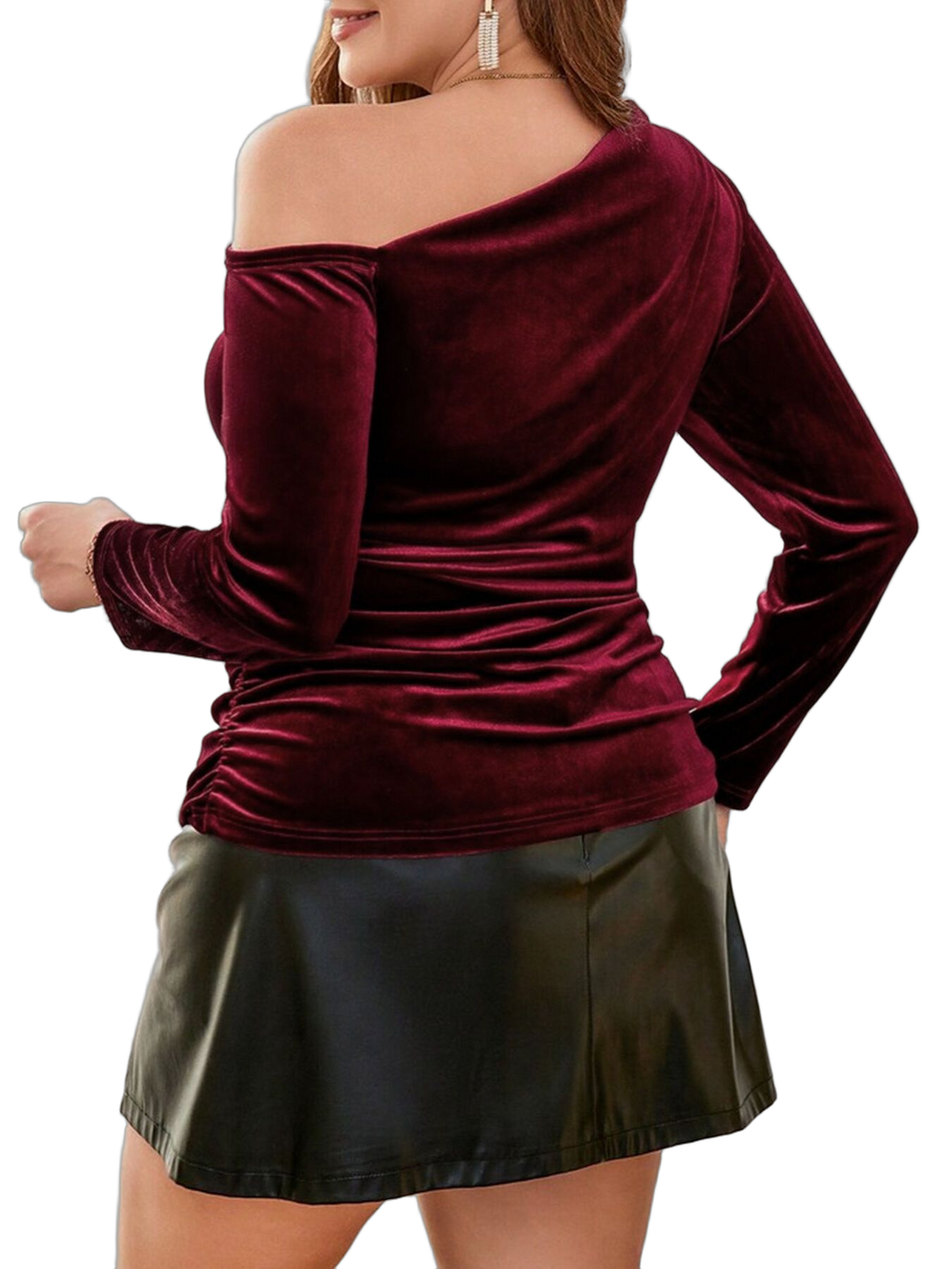 Back view of woman wearing burgundy velvet one-shoulder blouse with long sleeves, ruched side and black skirt