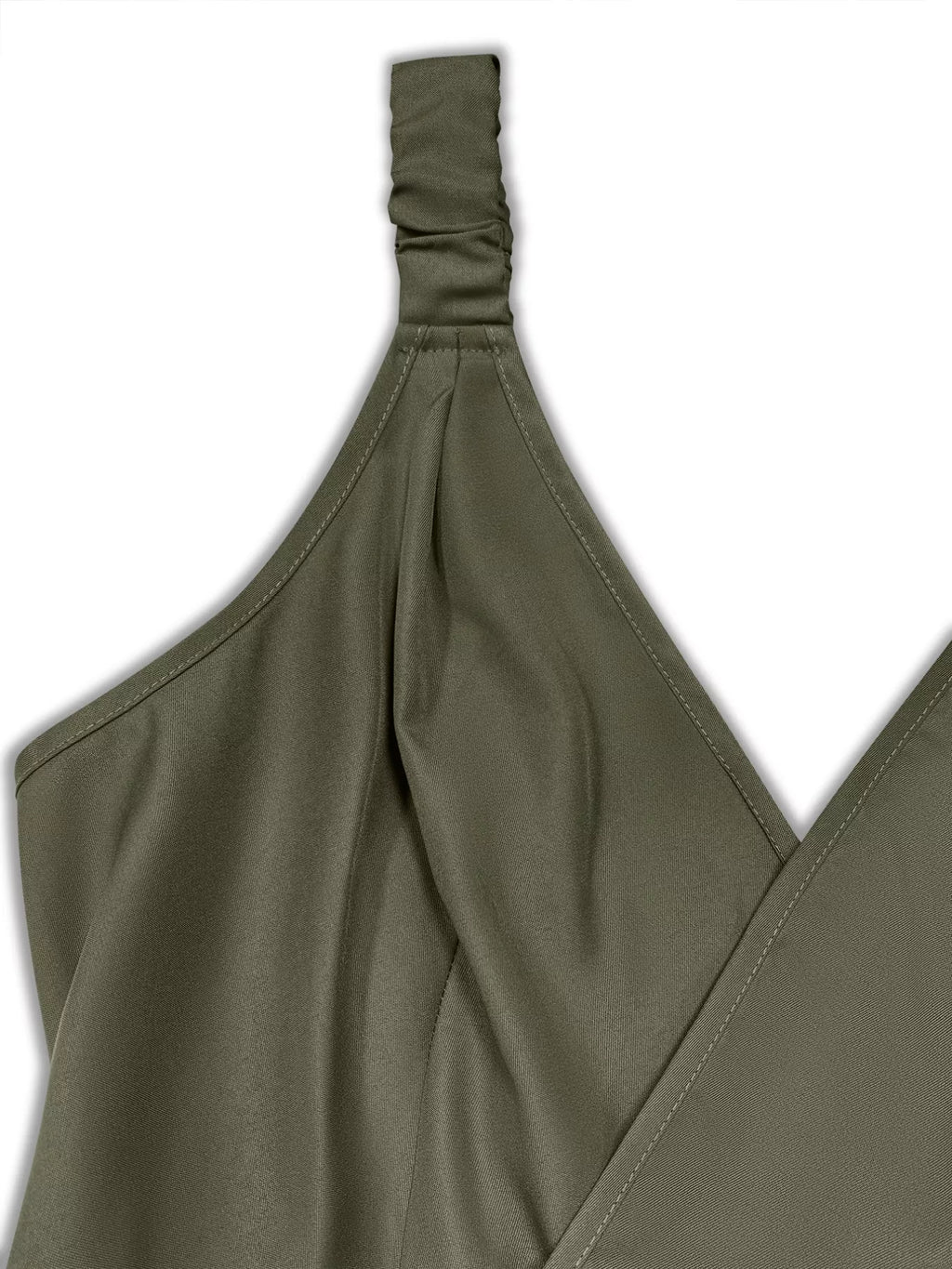 Olive-green fabric close-up showing a ruched shoulder strap and crossover V-neck with stitched seams
