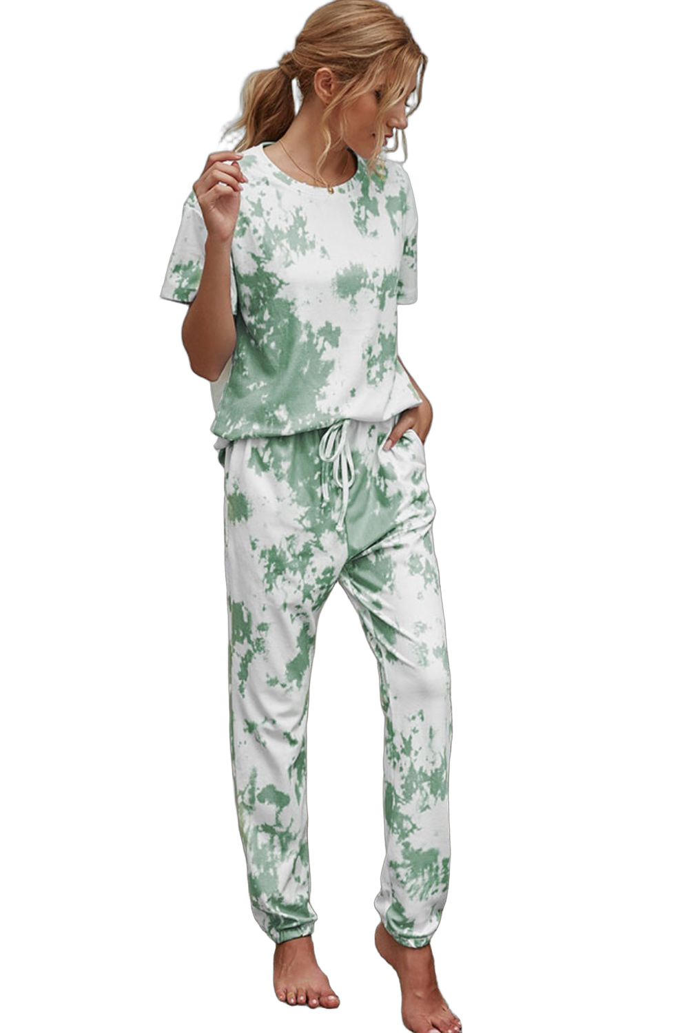 Model wearing green-and-white tie-dye short-sleeve tee and drawstring waist joggers with side pockets