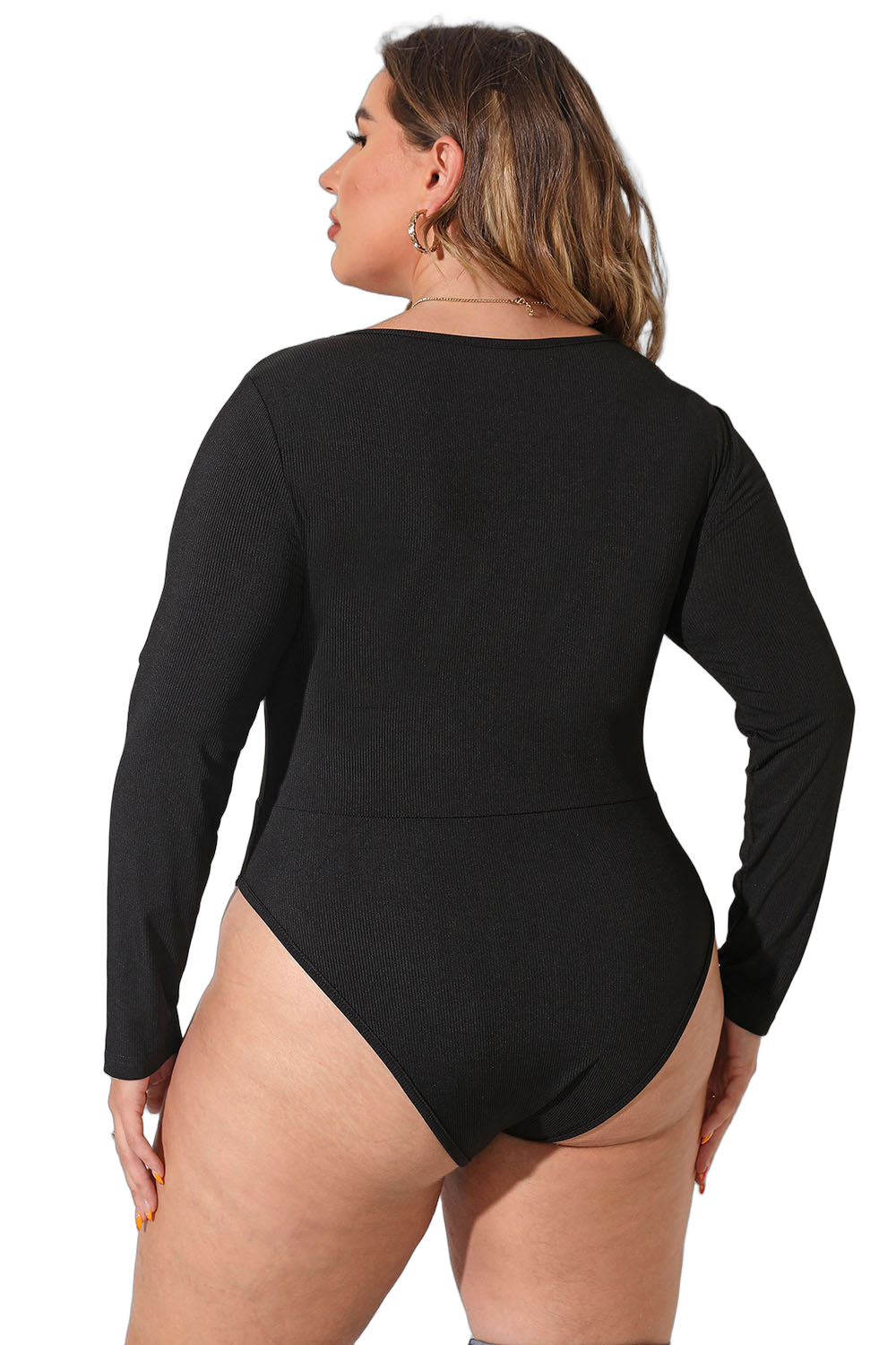 Plus-size model wearing black long-sleeve ribbed round-neck bodysuit, back view, high-cut leg openings