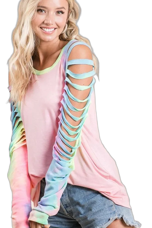 Woman wearing blush jersey top with pastel tie-dye sleeves with laser-cut slits and cold-shoulder.