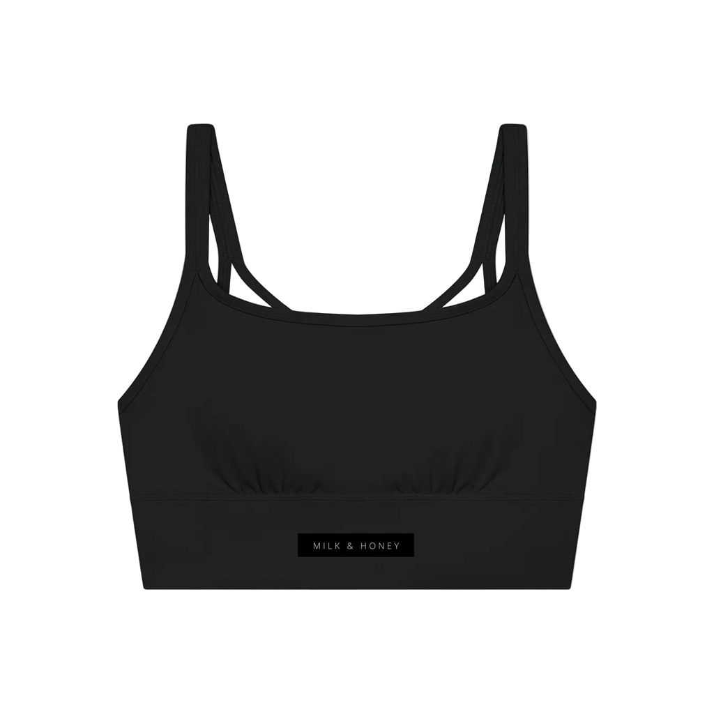 Dark cropped tank top with thin double shoulder straps, gathered bust seam and MILK & HONEY label on the lower band