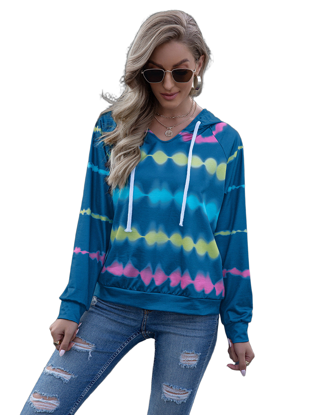 Model wearing sky-blue tie-dye hooded pullover with white drawstrings and raglan long sleeves, paired with ripped jeans
