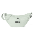Light green padded crossbody bag top with adjustable strap, front zip pocket, corded toggle and MILK&HONEY label