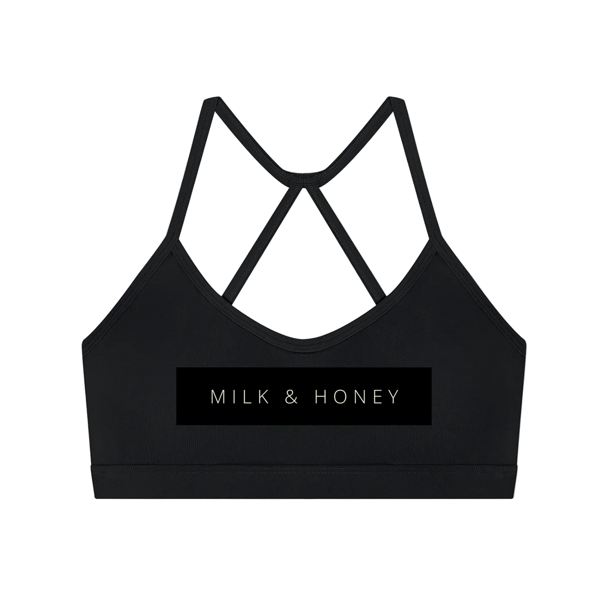 Black sports bra with thin crisscross back straps and centered 'MILK & HONEY' rectangular logo