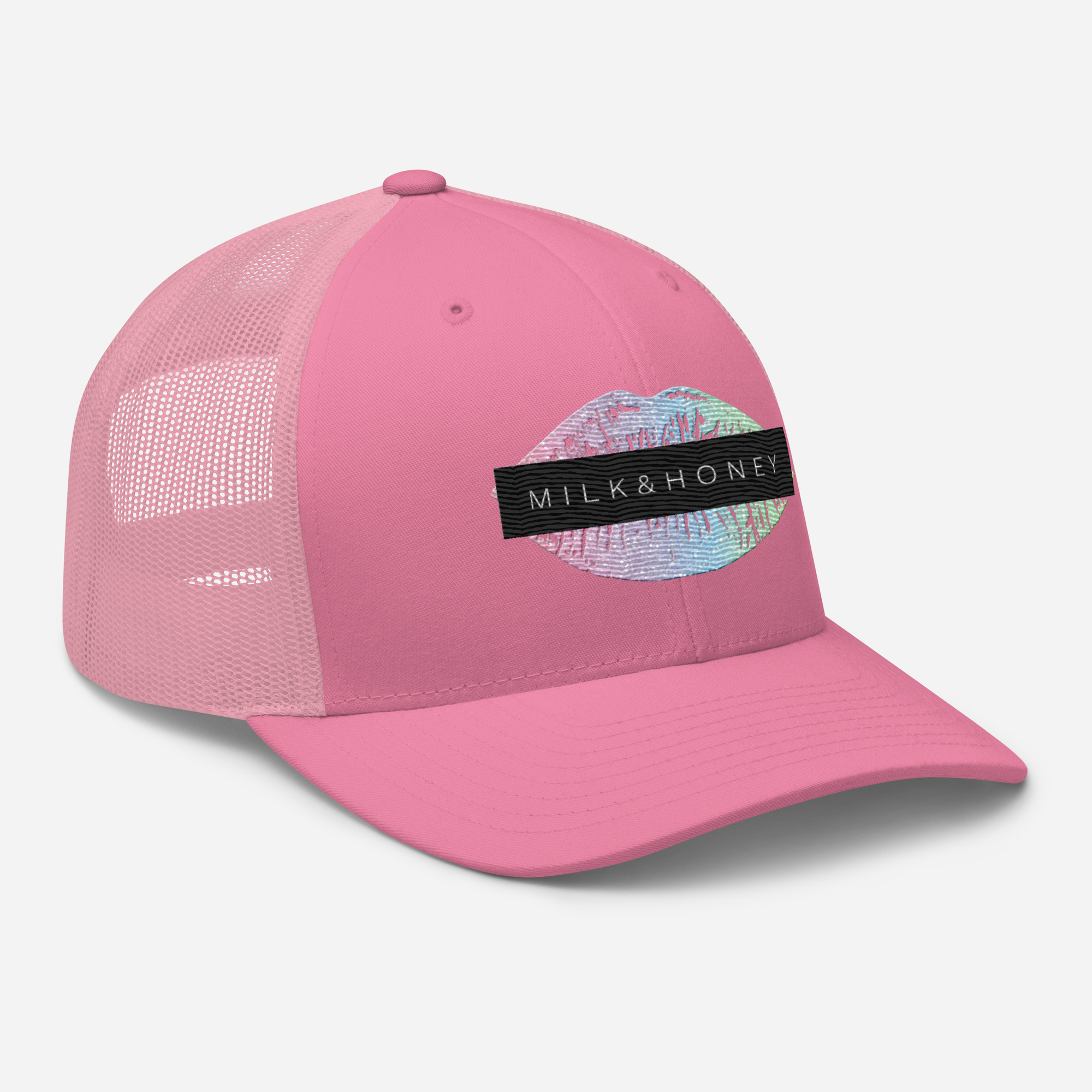Pink trucker cap with mesh back, embroidered multicolor lips patch and black MILK&HONEY label on front