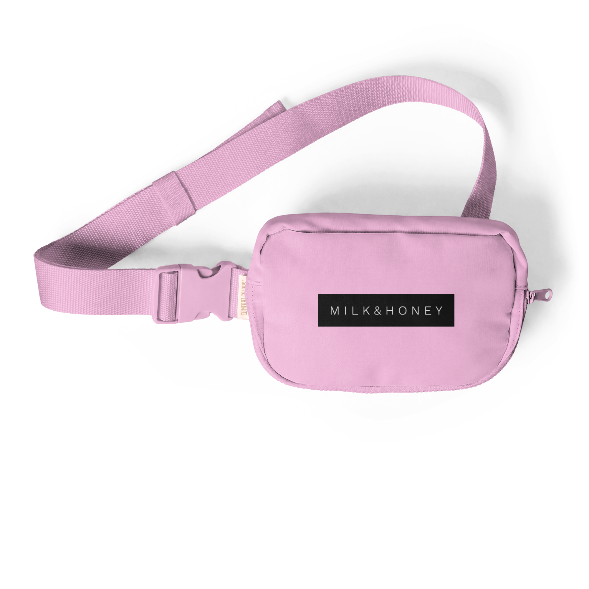 Pink sling strap with woven texture, plastic side-release buckle and top corner of pouch showing MILK&HONEY logo and zipper…